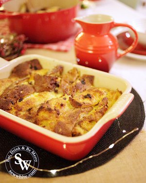 Fresh from the oven is the Christmas Panettone Bread and Butter Pudding in a red earthenware LE Creuset rectangular dish