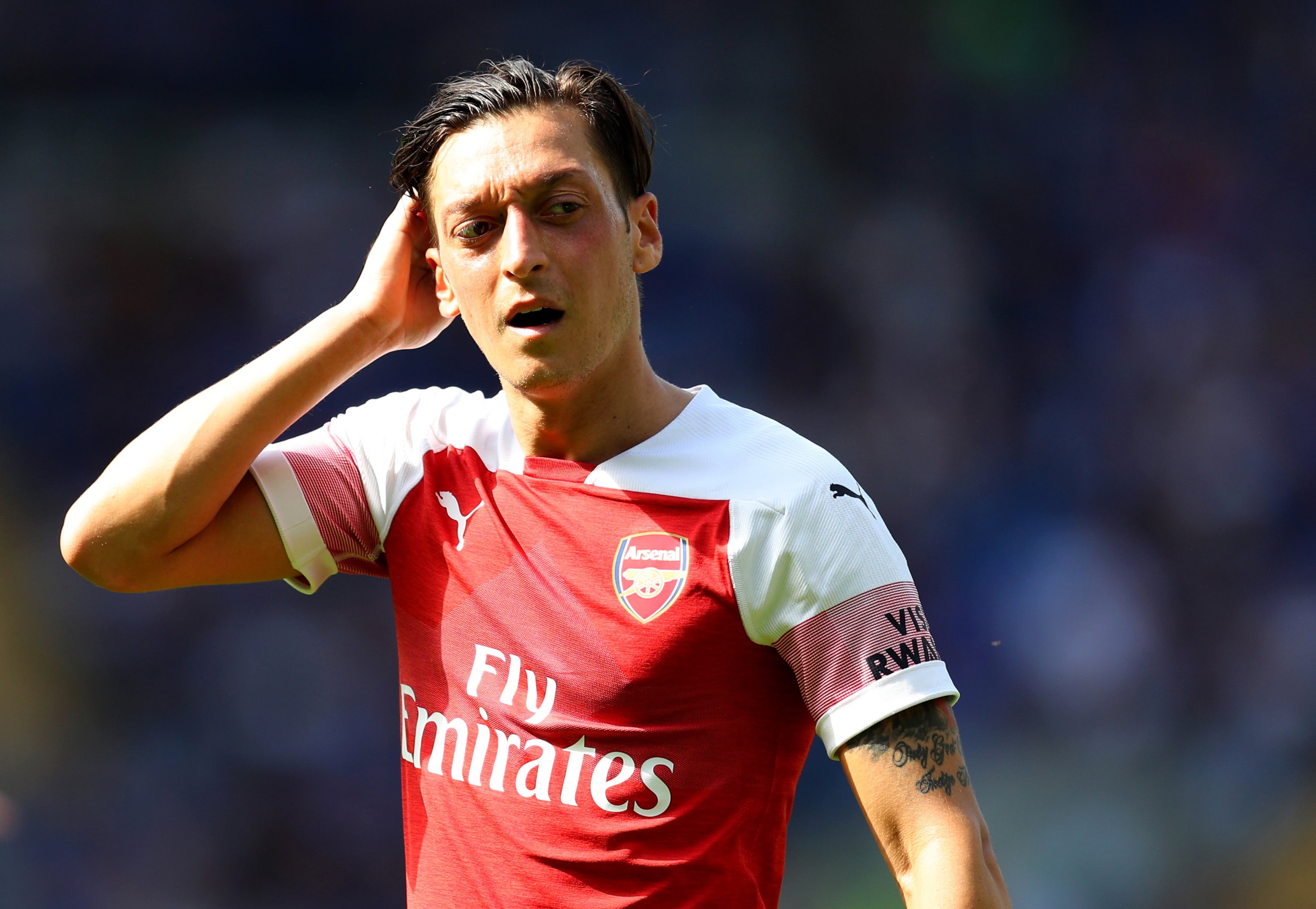 Ozil wants to stay with Arsenal and is prepared to fight for his place. (Photo courtesy: AFP/Getty)