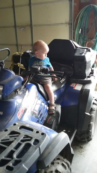 Miles likes the four wheeler