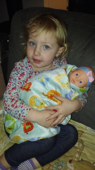 We visited Murry clause (my moms work party) and he delivered Hazel a baby doll, there were two dinkie babies there and she was proud to have the third! And she did SO good with Santa this year, she was scared but told me she was going to be brave, and she was!