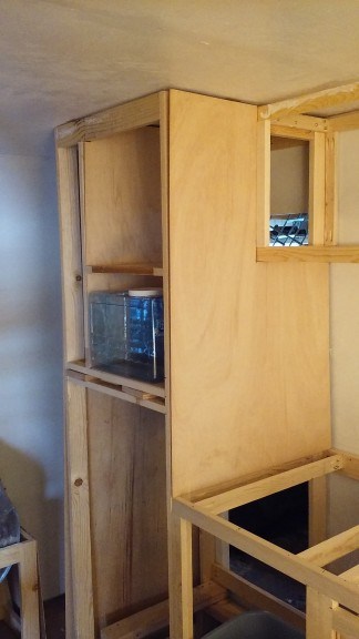 facing the cabinets