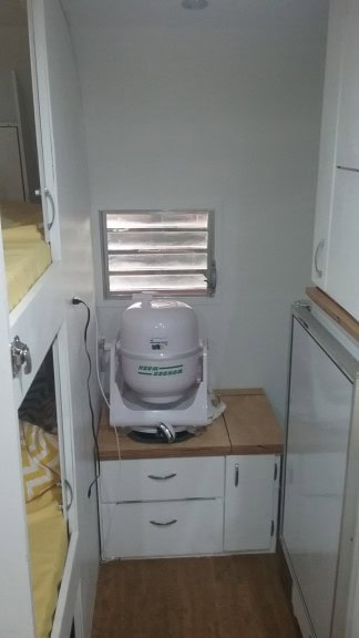 Our washer, on the toilet I still need to hook up!