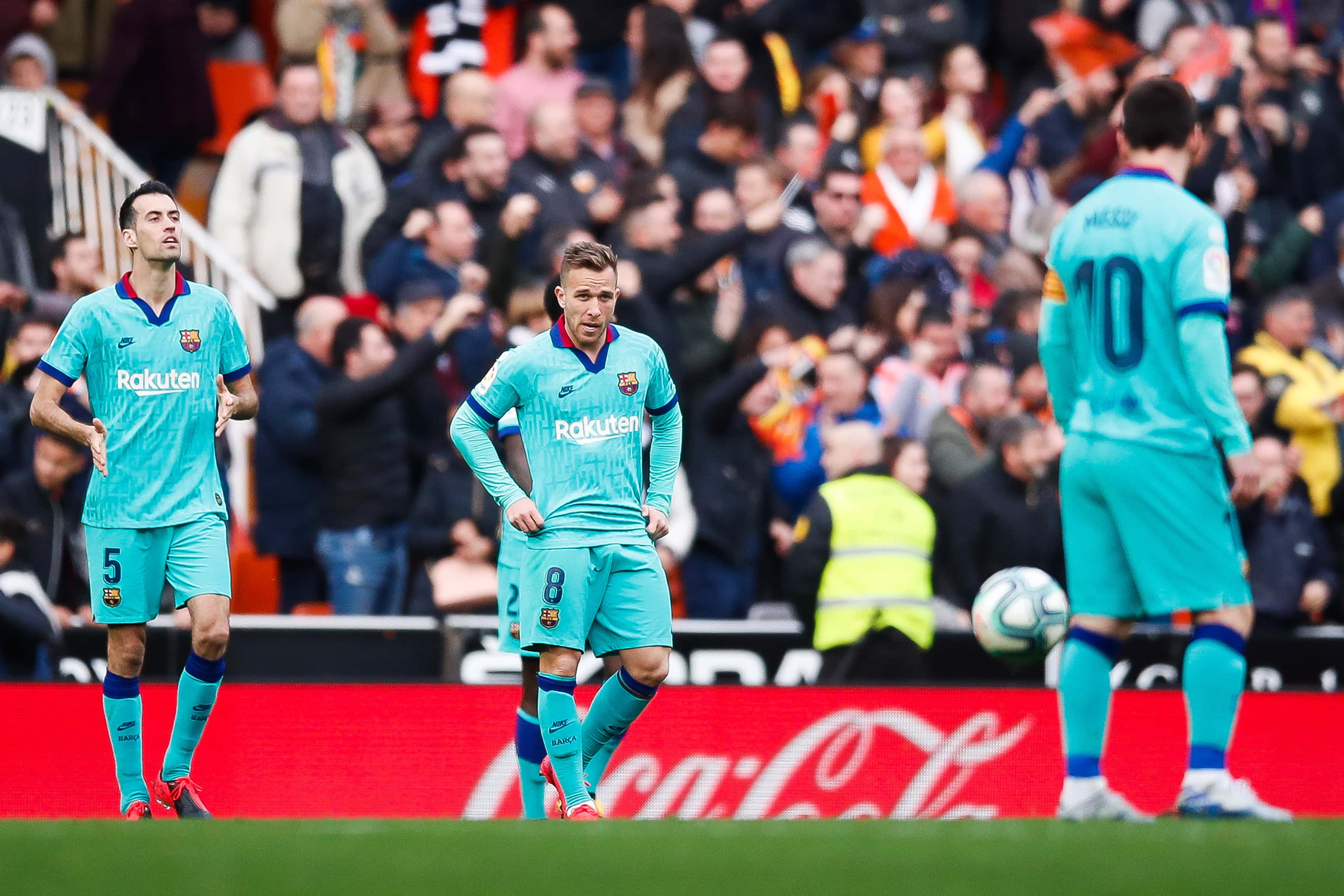 VALENCIA, SPAIN - JANUARY 25: Arthur Melo of FC Barcelona looks dejected following his side conceding the first goal during the La Liga match between Valencia CF and FC Barcelona at Estadio Mestalla on January 25, 2020 in Valencia, Spain. (Photo by Eric Alonso/Getty Images)