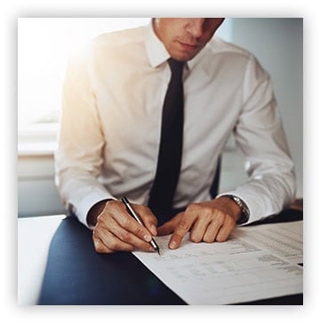 law_pic_1 man reviewing business documents