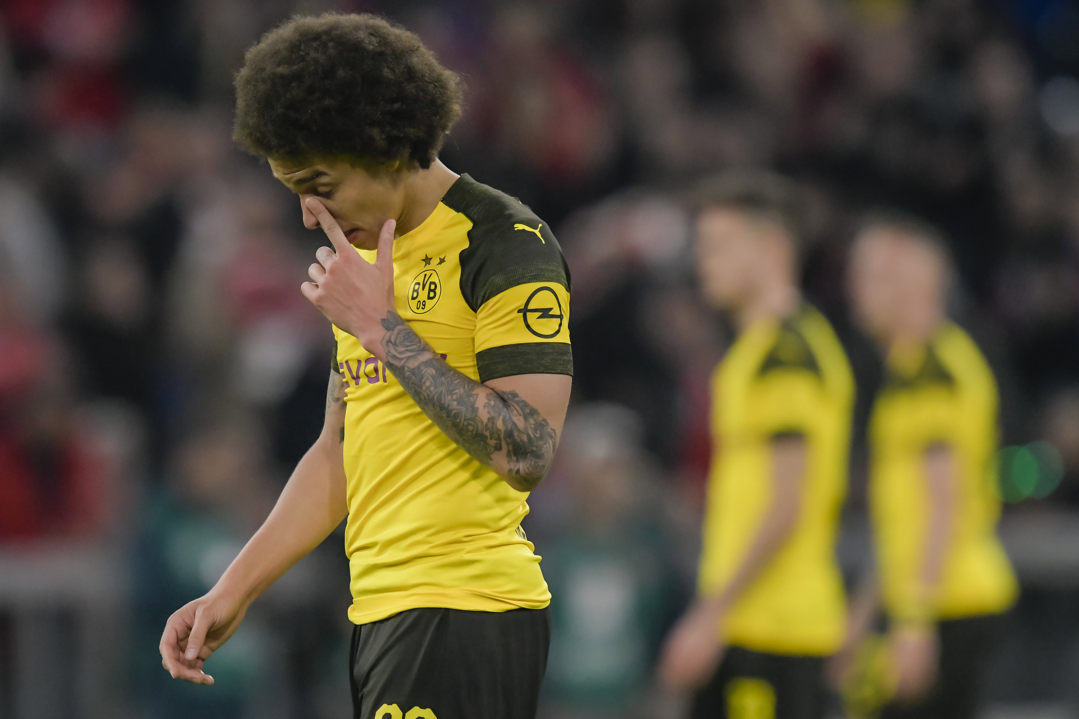 Axel Witsel misses out with an injury (Photo by Guenter SCHIFFMANN / AFP) / RESTRICTIONS: DFL REGULATIONS PROHIBIT ANY USE OF PHOTOGRAPHS AS IMAGE SEQUENCES AND/OR QUASI-VIDEO (Photo credit should read GUENTER SCHIFFMANN/AFP via Getty Images)
