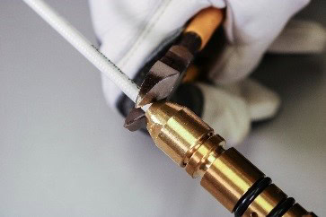Trim AccuLock S Liner flush with back of power pin. How To Install AccuLock™ S Liners, step 4a