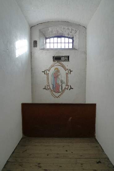 Grace Gifford's Prison Cell in Kilmainham Gaol with the mural she painted