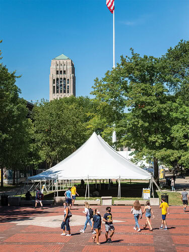 In an effort to give students additional space where they can study and take a break between classes, U-M has erected 13 canopies around campus. Nine of the canopies are located Central Campus (including this one on the Diag) and four on North Campus. Combined, they provide seating for approximately 500 people. Even though the canopies are located outside, students must wear a mask and social distance. (Photo by Scott C. Soderberg/Michigan Photography)