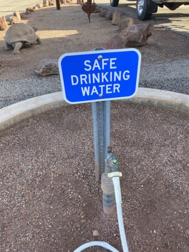 If the water is safe to drink you will see a sign like this or "potable water" sign. best drinking water hose for rv the camping nerd.JPG