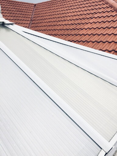 After - a shining white clean conservatory roof