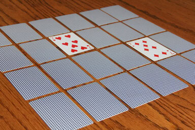 Photo of playing cards arranged for playing memory games - a great way for kids to practice math skills.
