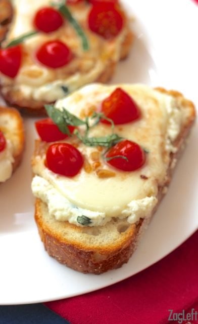 Two slices of caprese toast on a plate