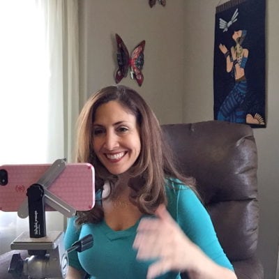 Jodi Aman Skypes with her clients online anxiety coaching group