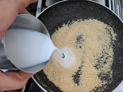 Adding Milk plus water to the semolina