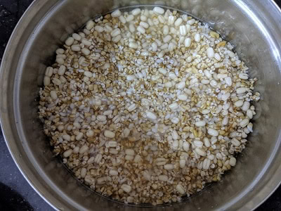 Soaking the ingredients for oats dosa