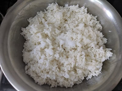 Pressure cooked rice being cooled