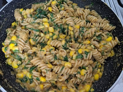 reserved pasta water added to adjust the consistency