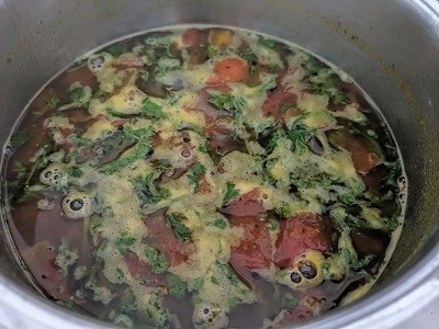 Once rasam froths, it is ready to temper and serve