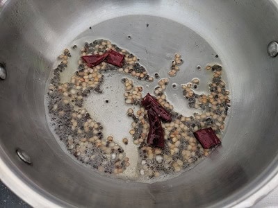 tempering in coconut oil for the pachai payaru sundal