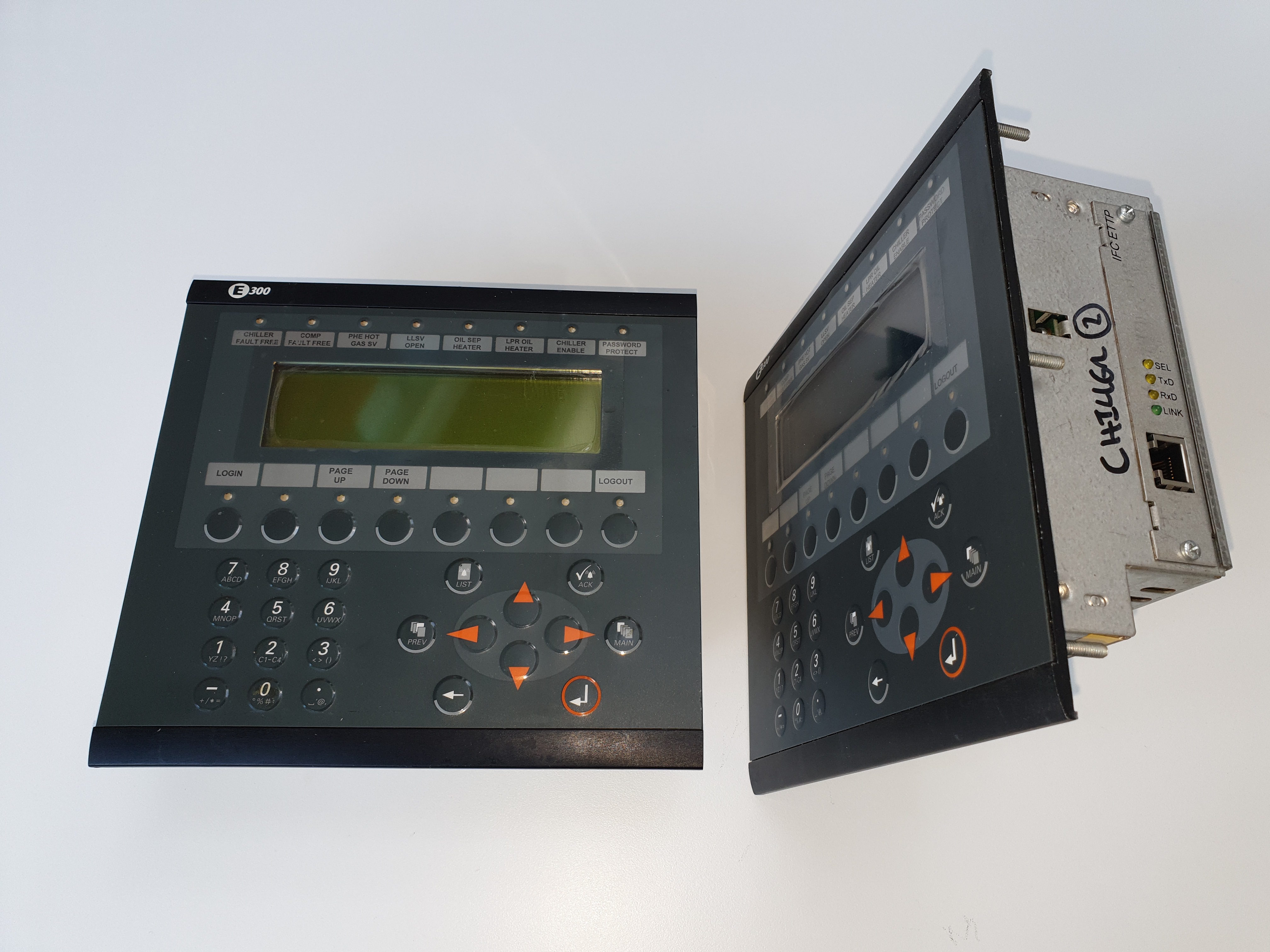 Chiller refurbishment of two controllers on white background