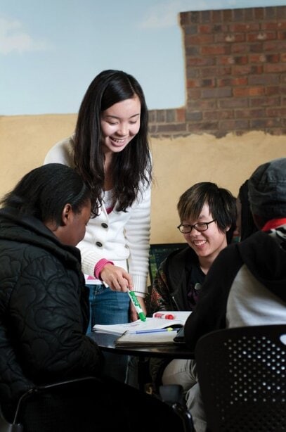 Instructor Sara Yang Ye Meng works with psychology major Kira Webb, who is Chinese, but having grown up in Roswell, Ga., never learned the language. Instructor Sara Yang Ye Meng works with psychology major Kira Webb, who is Chinese, but having grown up in Roswell, Ga., never learned the language.