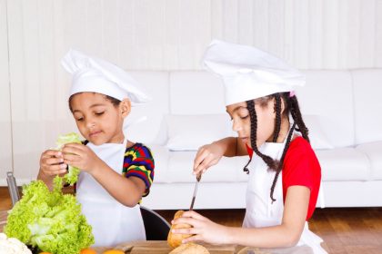 Siblings making sandwich Siblings making sandwich