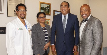 From left, Dr. Chad R. Ritch, Dr. Jacquiline Bisasor-Mckenzie, Dr. Christopher Tufton, and Dean Henri R. Ford. - Jamaican Minister of Health visits Univ. of Miami Health System