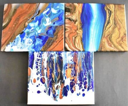 three complete acrylic pour waterfall paintings