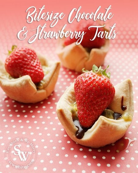 bite-size chocolate and strawberry tarts topped with a scoop of passionfruit bite-size chocolate and strawberry tarts topped with a scoop of passionfruit