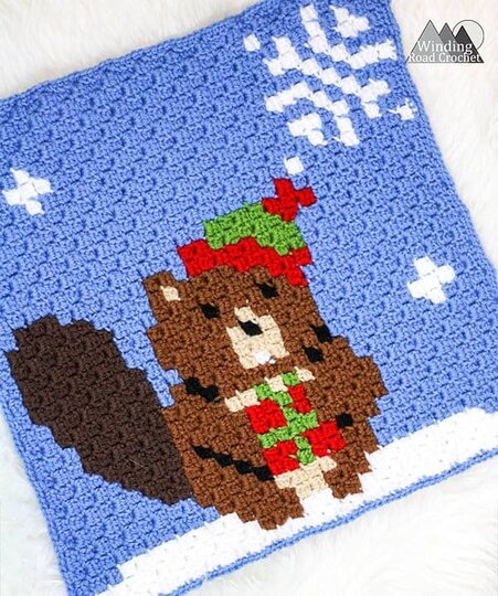 The Busy Beaver Crochet C2C Square | Crochet a beautiful blanket for the holidays, using the corner to corner crochet method. Free Crochet charts and written pattern available. Woodland Winter Wonderland C2C Corner to Corner Crochet Blanket. Use the charts for any tapestry crochet, make a wallhanging, or just make one square into a holiday tote. #crochet #crochetpattern #crochetgraph