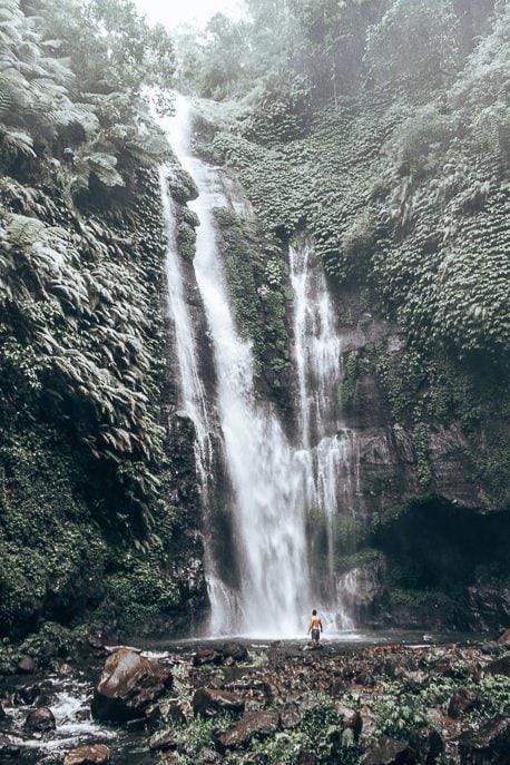 25 Incredible Photos Of Bali To Spark Your Wanderlust 8 P Bevan standing underneath Fiji Waterfalls, Bali Gallery