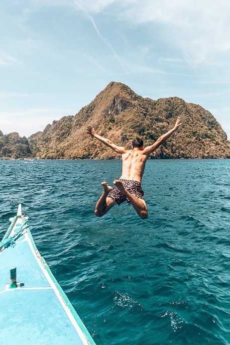 40 Stunning Photos That Will Make You Want To Visit The Philippines 15 P Bevan jumps off the tour boat whilst on Tour D in El Nido