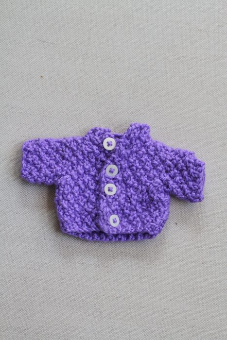 purple knitted sweater