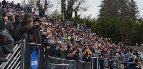 Fans celebrate after the touchdown that won Shepherd Rams the game Saturday.