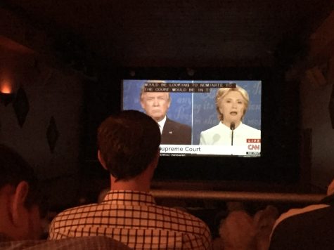 Residents watch as the nominees debate for the third and final time before the election.