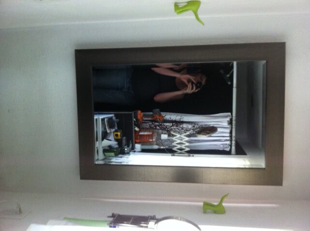 Oh, and I made a medicine cabinet, well started it... this is wwhere the window used to be in the bathroom, its sure weird to have a gull sized mirror again
