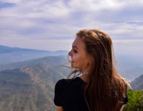 Pandora Affemann posing at the top of Montserrat mountain in Catalonia, Spain.