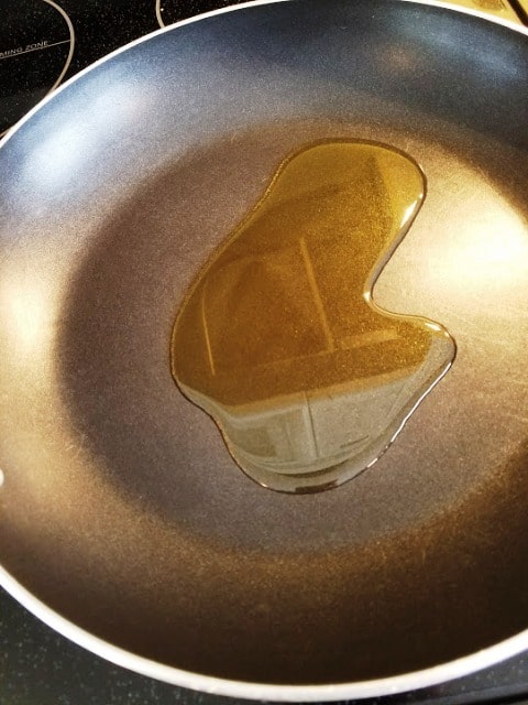 olive oil in saucepan Slow Cooker Mississippi Pot Roast
