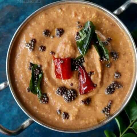 Roasted Eggplant Chutney with a tempering of mustard seeds, curry leaves and dry red chillies