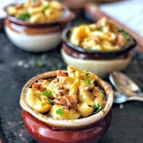 Tortellini is coated in a rich, carbonara-inspired cream sauce flavored with salty parmesan cheese, garlic, and smoky bacon. Dinner in under 20 minutes? You can bet on it!