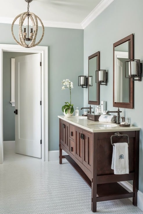 Shades of blue gray paint are totally on trend and shown to increase a home's resale value. Isn't that crazy? Read on to see some of my favorite blue gray paint colors! Benmjamin Moore Gray Wisp Bathroom