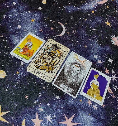 same card from different decks strength tarot card from different decks