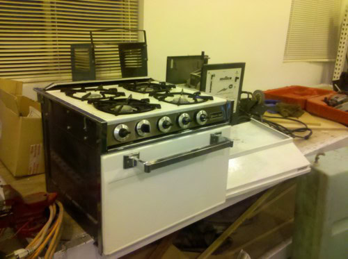 and my favorite stove ever, reclaimed from Jed's camper, it's adorable!