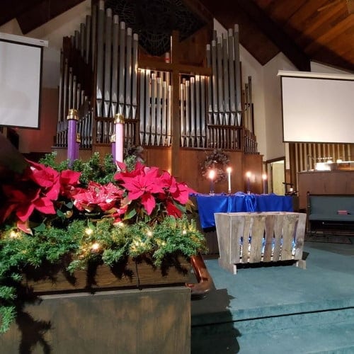 bright Christmas decor in the chancel area