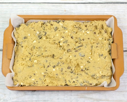 cookies and cream bars dough in pan