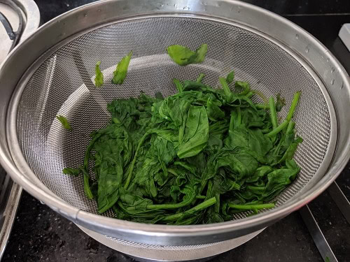 Blanched spinach ready