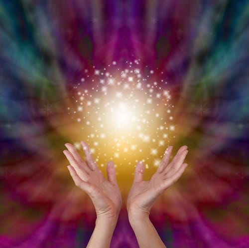 shutterstock_279624407 (2) picture of hands holding ball of golden light depicting energy healing changes