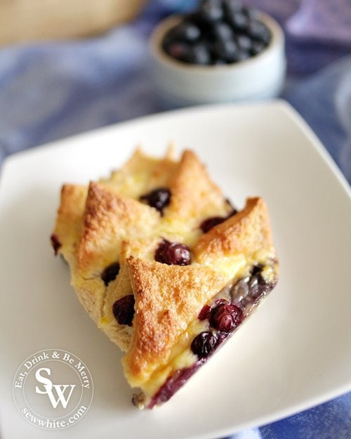 Fresh from the oven a golden brown Blueberry and Lemon Bread and Butter Pudding