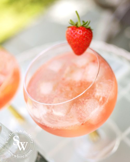 Sunset red gin and tonic made with Strawberry Jam and Whitley Neill Gin and Gallybird Tonic