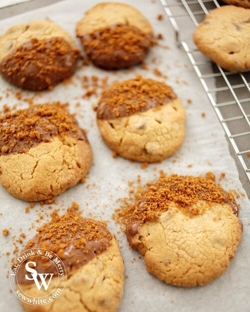 Golden baked Biscoff cookies dipped in chocolate and topped with biscoff biscuit crumbs for decoration